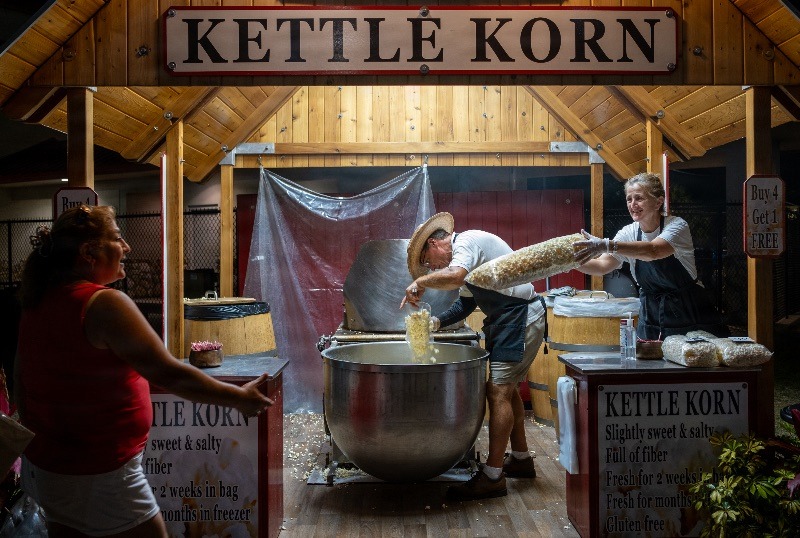 Venders sell kettle corn at the Florida Strawberry Festival in Plant City, Florida March 9, 2025. Photo by Daniel LeClair