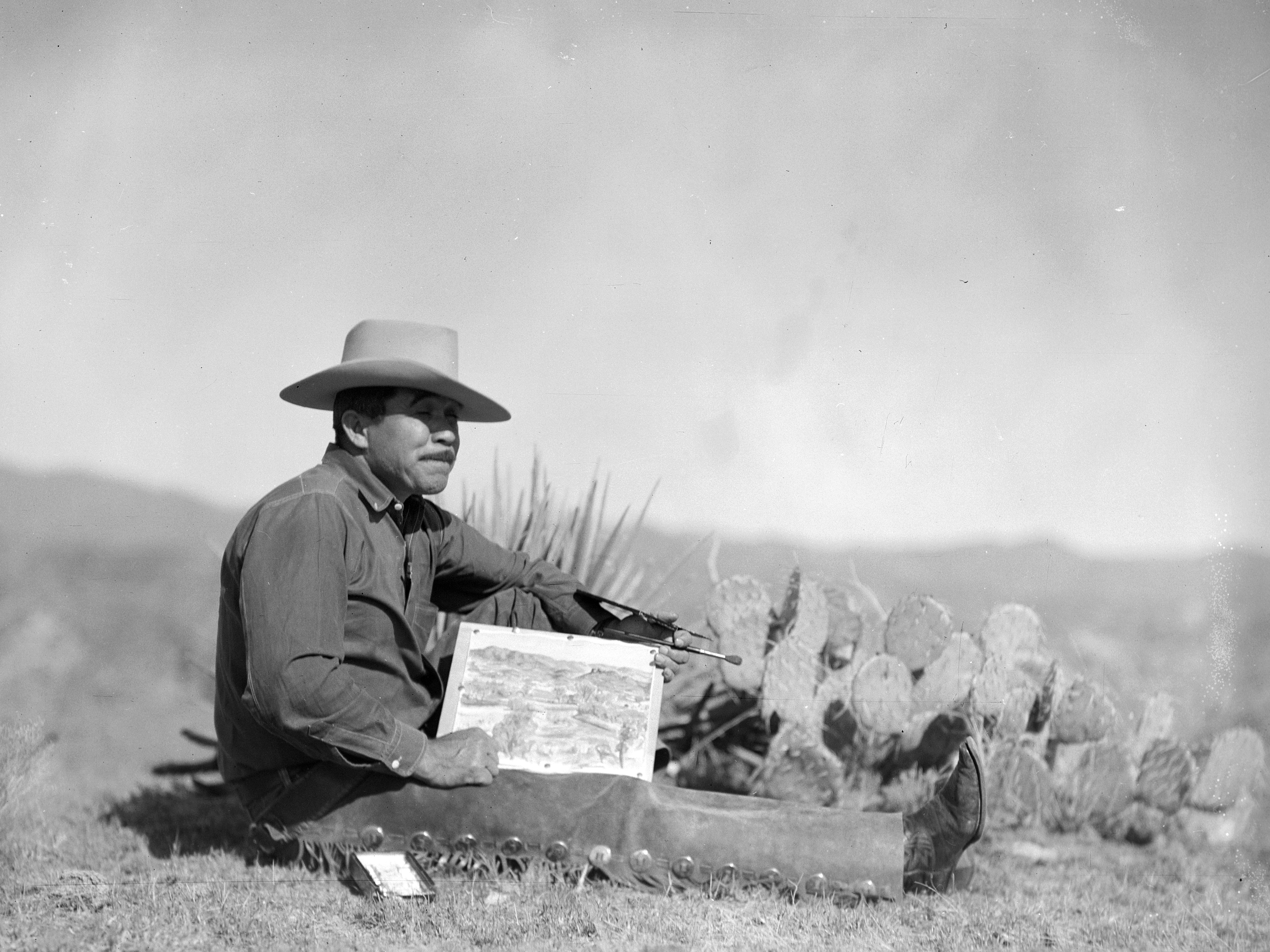 Tucson Western Artist Pete Martinez at work in the 1940's.