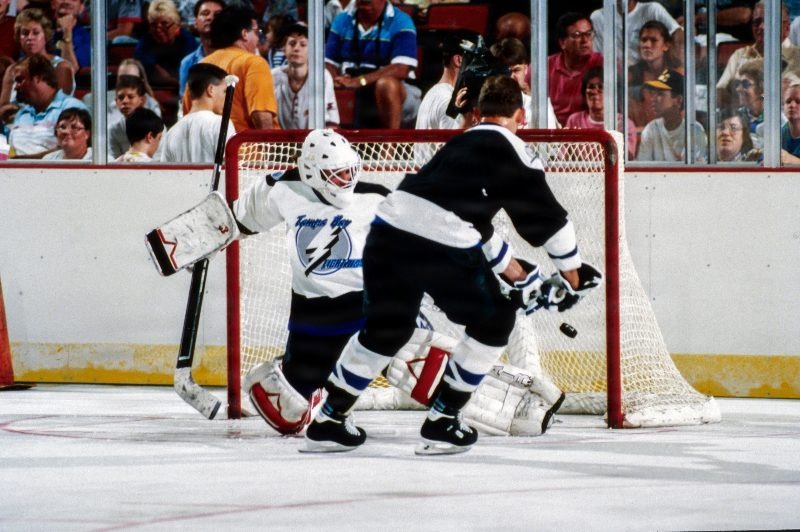 Anatoli Semenov takes at shot on goal at goalie Manon Rheaume during Hockeyfest II on August 22, 1992