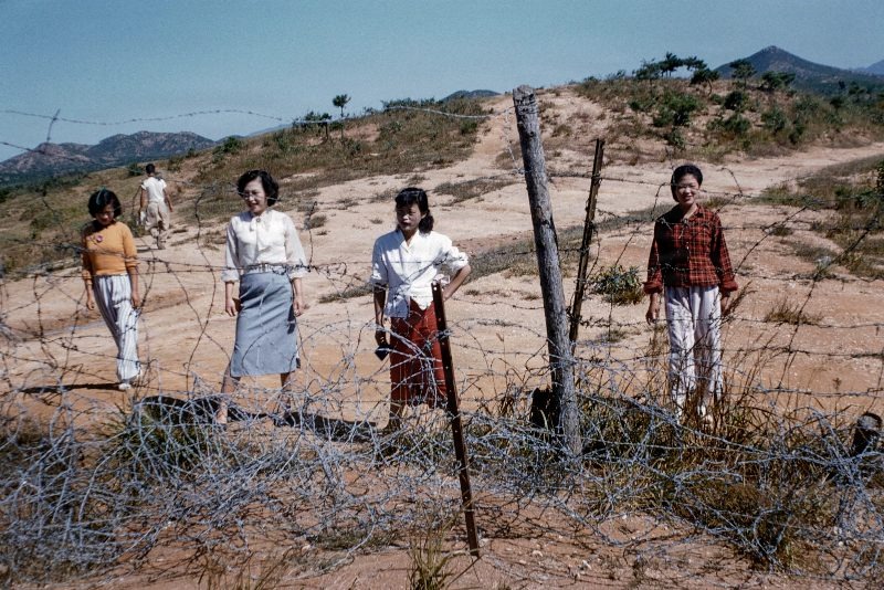 South Korean women outside the fence at a US Army base near the DMZ.                                   