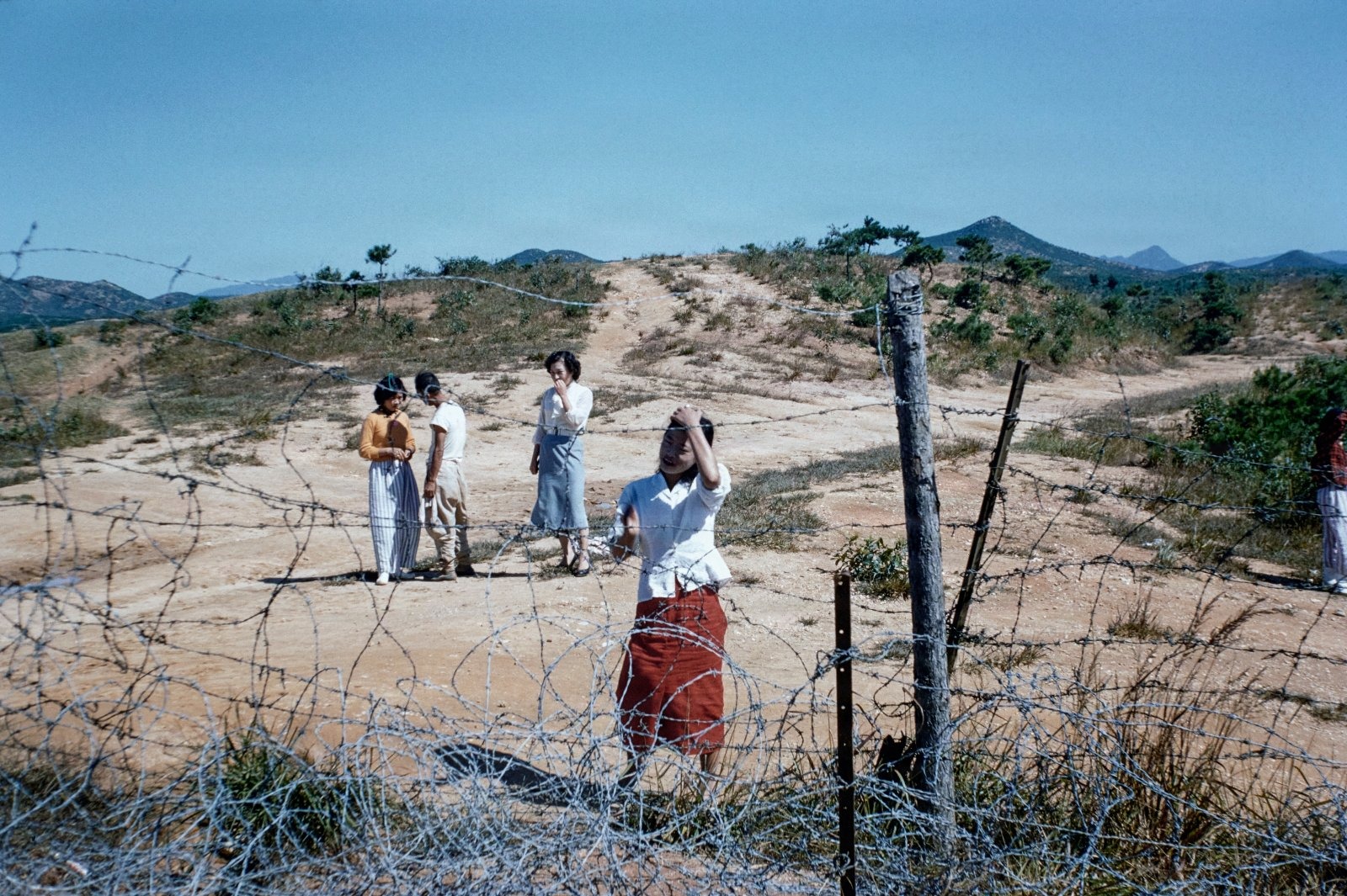 South Korean women outside the fence at a US Army base near the DMZ.                                