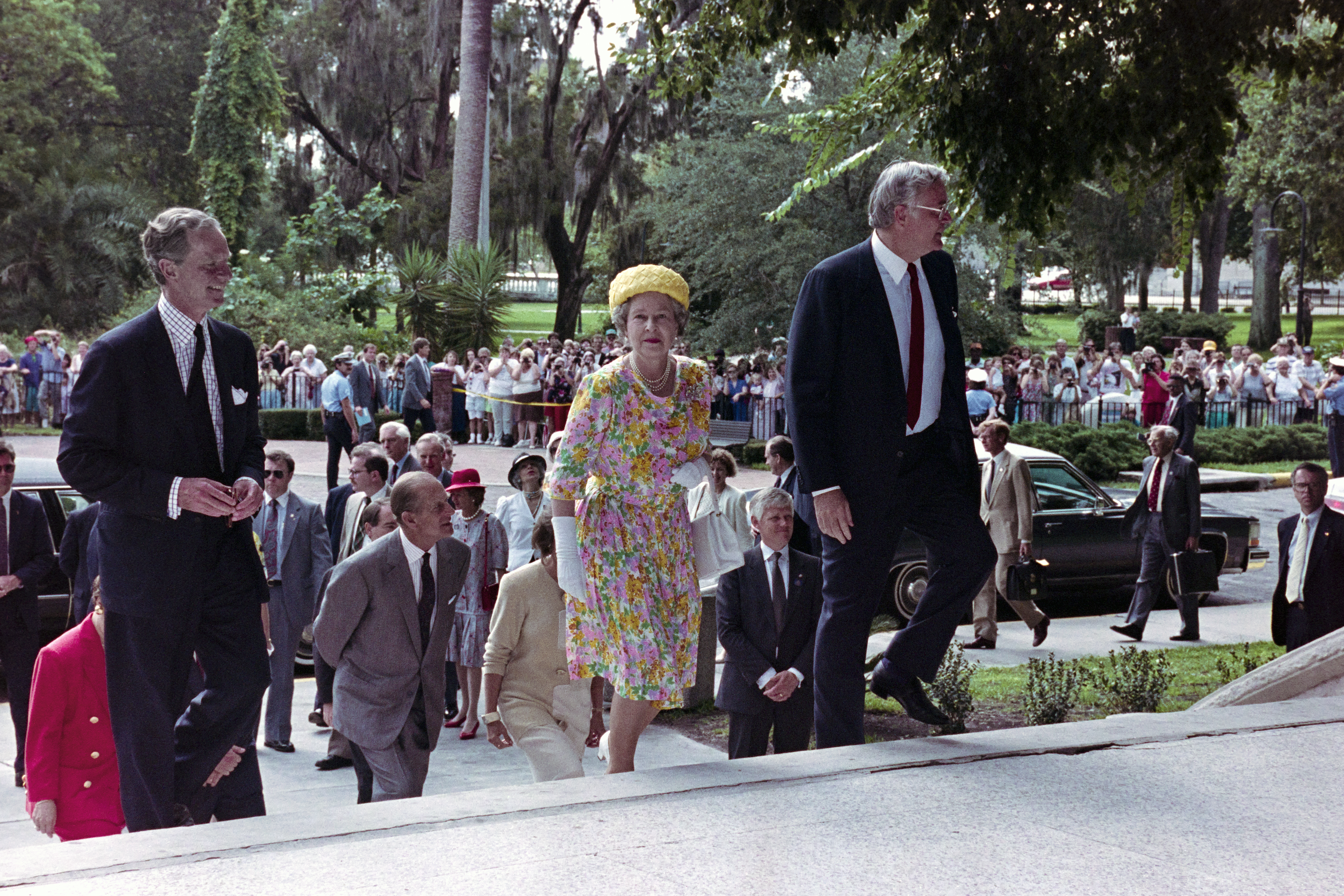 Queen Elizabeth II visited Tampa, Florida, on May 20, 1991, arriving on the royal yacht Britannia to honor General H. Norman Schwarzkopf at MacDill Air Force Base. She then traveled via motorcade to the University of Tampa for a formal reception where Mayor Freedman presented her with a crystal palm tree gift.