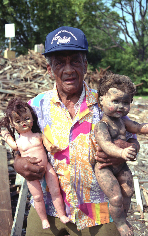 ‘Granpa’ Sam Mackey, in front of the remains of ‘The Baby Doll House’, demolished by Mayor Coleman Young in 1987.