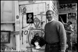 Artist Tyree Guyton in front of “OJ House”, part of the Heidelberg Project , Detroit, 1987.