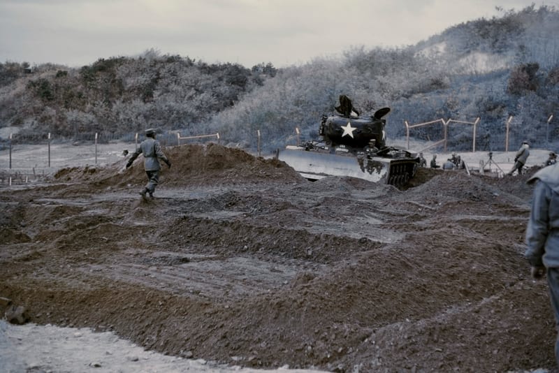 Earth moving with US Army tanks near the DMZ in South Korea                                   