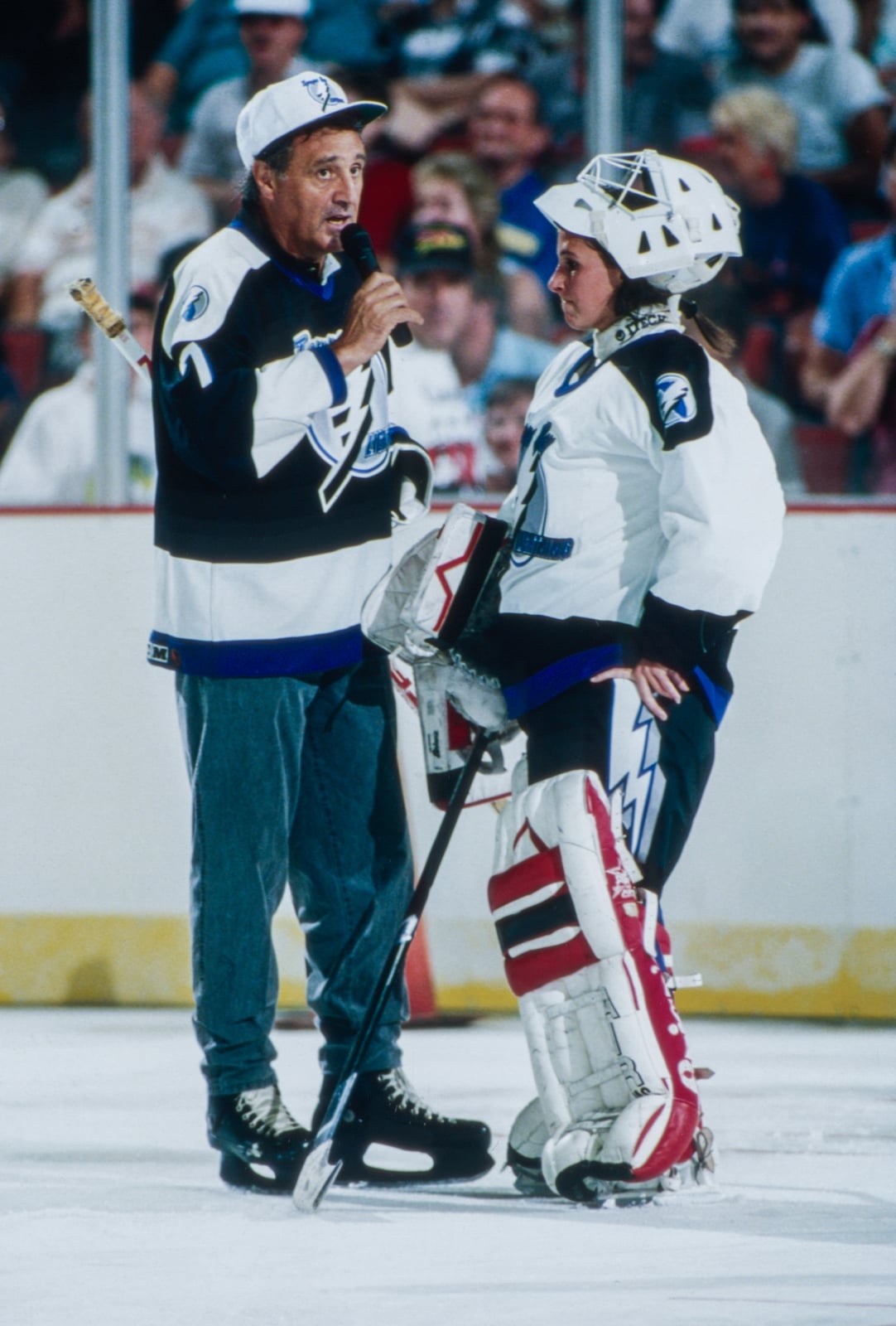 Manon Rheaume chats with Phil Esposito on the ice at Hockeyfest II in Tampa on August 2, 1992.